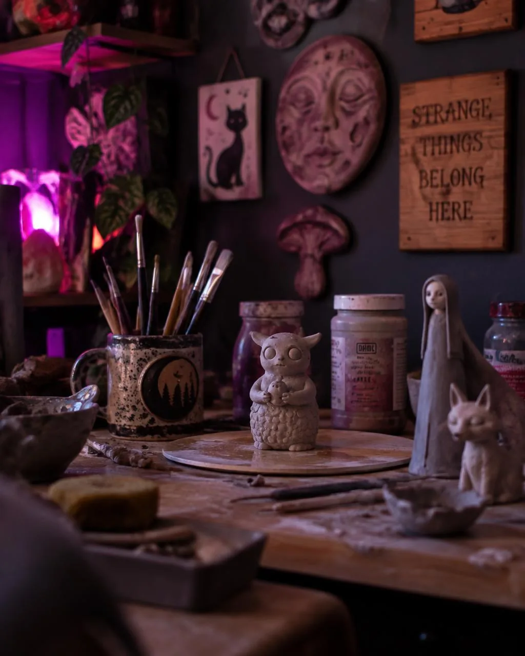 Inside The Fluffy Raven studio — handmade clay sculptures and wall plaques